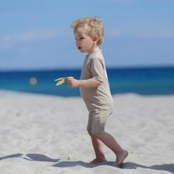 Petit Crabe Cotton & Linen Exclusive Noe UV SS Bodysuit - Cappuccino